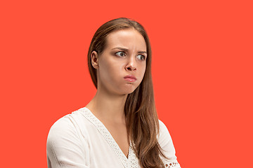 Image showing Annoyed young woman feeling frustrated with something. Human facial expressions, emotions and feelings.