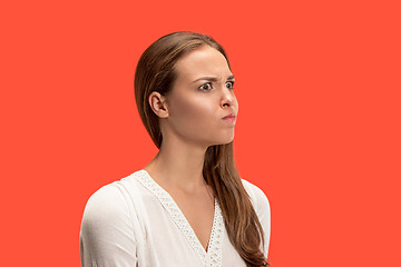 Image showing Annoyed young woman feeling frustrated with something. Human facial expressions, emotions and feelings.