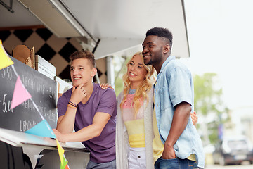 Image showing happy customers or friends at food truck