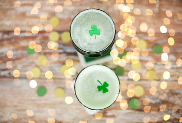 Image showing glasses of green beer with shamrock from top