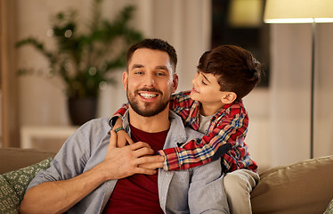 Image showing portrait of happy father and little son at home