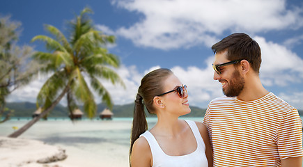 Image showing happy couple in sunglasses outdoors in summer