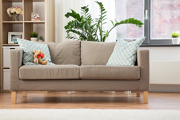 Image showing sofa with cushions at cozy home living room