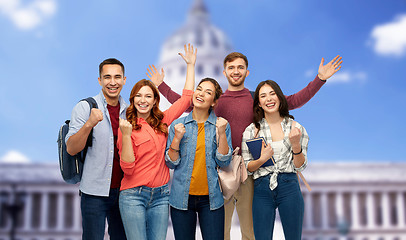 Image showing happy students celebrating over capitol building