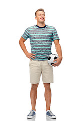 Image showing smiling young man with soccer ball