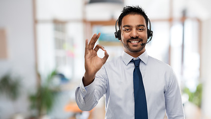 Image showing businessman or helpline operator showing ok sign