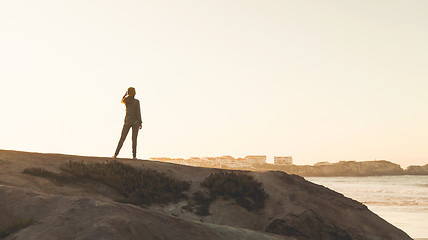 Image showing Woman over the cliff