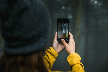 Image showing Taking a picture to a forest