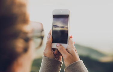 Image showing Woman taking a picture