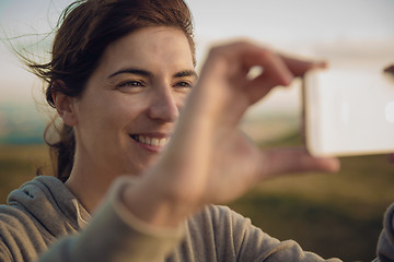 Image showing Woman taking a picture