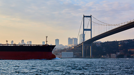 Image showing Turkey, Istanbul, Bosphorus Channel, Bosphorus Bridge, an cargo ship under the Bridge.