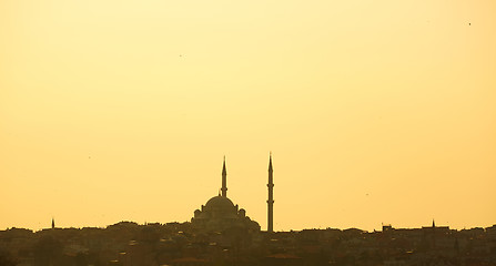 Image showing Silhouette of a mosque on a background of mountains. Background