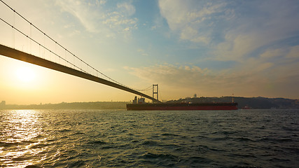 Image showing Turkey, Istanbul, Bosphorus Channel, Bosphorus Bridge, an cargo ship under the Bridge.