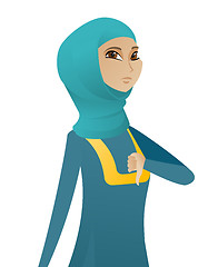 Image showing Disappointed muslim business woman with thumb down