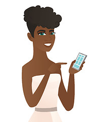 Image showing Young african fiancee holding a mobile phone.