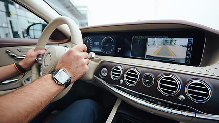 Image showing Man sitting and driving in the car.