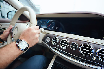 Image showing Man sitting and driving in the car.