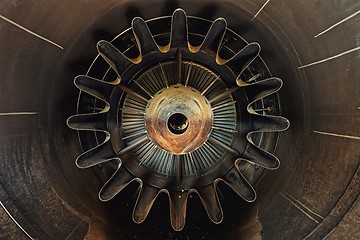 Image showing Rusty old jet engine closeup as background