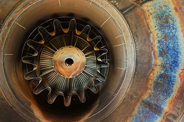 Image showing Rusty old jet engine closeup as background