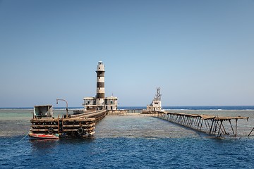 Image showing Tall lighthouse on the sea