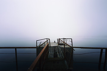 Image showing Damaged pier in the mist at morning