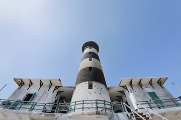 Image showing Tall lighthouse on the sea