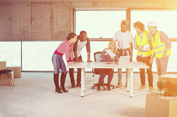 Image showing multiethnic business people on construction site