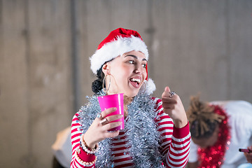 Image showing young multiethnic business couple celebrating new year party