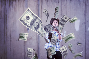 Image showing businessman making the rain of money