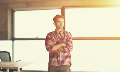 Image showing portrait of young casual businessman on construction site