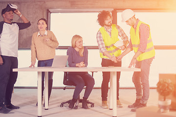 Image showing group of multiethnic business people on construction site