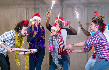 Image showing multiethnic group of casual business people dancing with sparkle