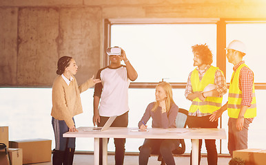 Image showing group of multiethnic business people on construction site