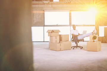 Image showing young black casual businessman on construction site