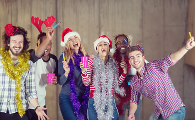 Image showing multiethnic group of casual business people dancing with sparkle