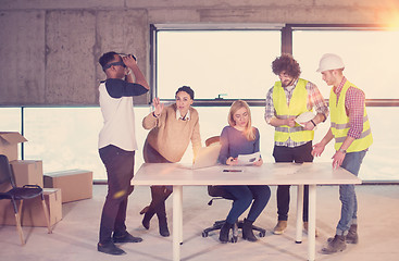 Image showing group of multiethnic business people on construction site