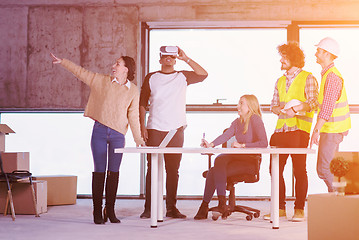 Image showing group of multiethnic business people on construction site