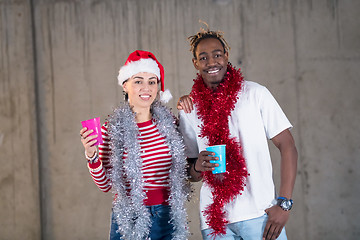 Image showing young multiethnic business couple celebrating new year party