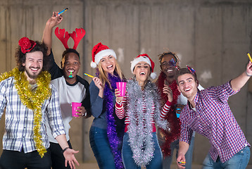 Image showing multiethnic group of casual business people dancing with sparkle