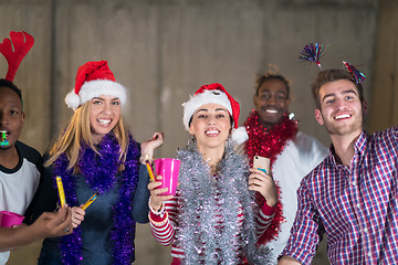 Image showing multiethnic group of casual business people dancing with sparkle