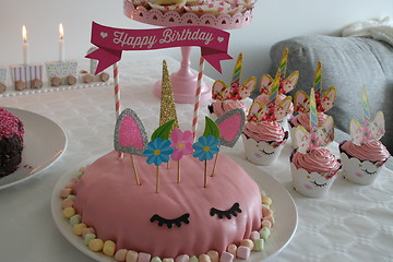Image showing Gateau, cup cakes, and candles