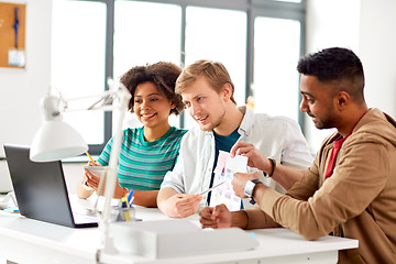 Image showing creative team having video conference at office