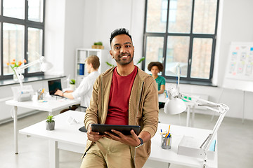 Image showing indian man with tablet pc computer at office