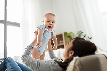 Image showing happy mother with little baby son at home