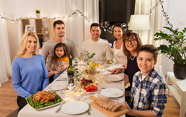 Image showing happy family having dinner party at home