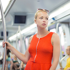 Image showing Lady traveling by metro.