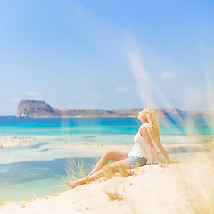 Image showing Relaxed Happy Woman Enjoying Sun on Vacations.