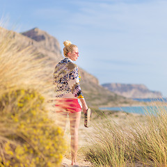 Image showing Free Happy Woman Enjoying Sun on Vacations.