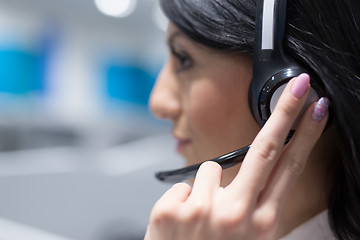 Image showing female call centre operator doing her job