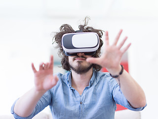 Image showing man using VR-headset glasses of virtual reality